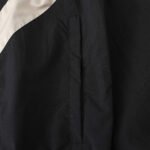 ⁦2425 Manchester United F.C. black windbreaker⁩ - الصورة ⁦6⁩