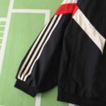 ⁦2425 Manchester United F.C. black windbreaker⁩ - الصورة ⁦8⁩